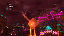 Screenshot of Eggmanland from Sonic Unleashed, depicting a giant golden Eggman statue.